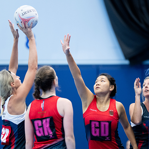 HKCC Netball Senior league players defend ball